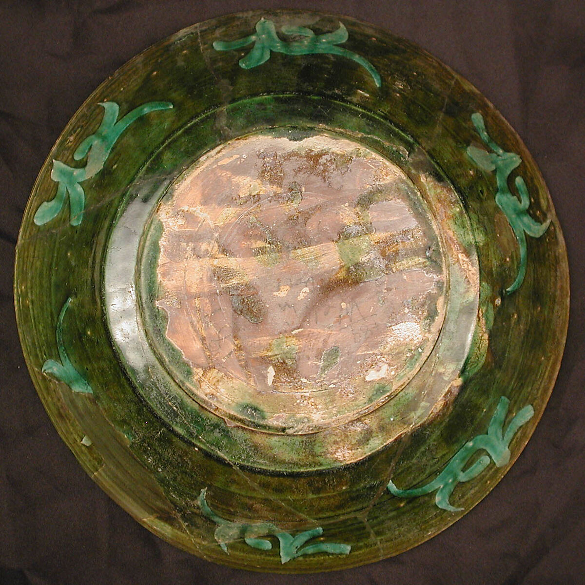 Bowl, Earthenware; purplish red slip, white slip decoration under green glaze