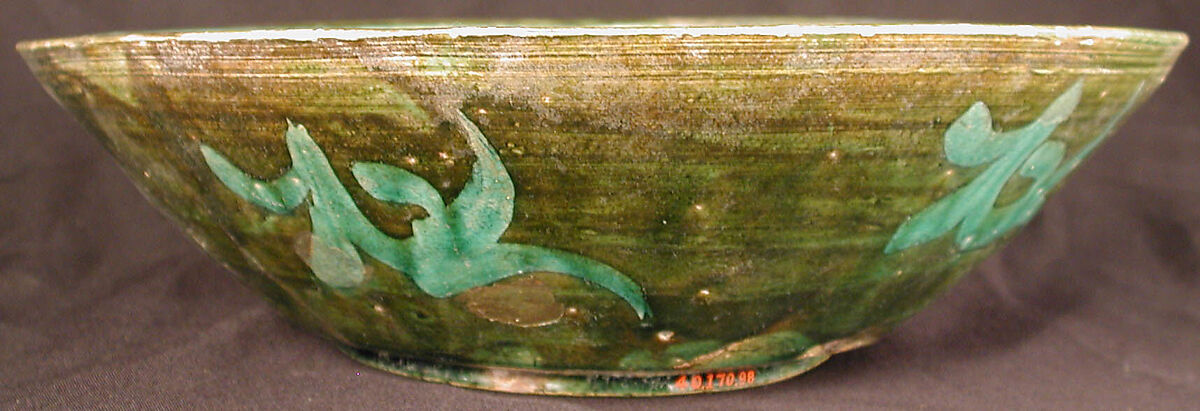 Bowl, Earthenware; purplish red slip, white slip decoration under green glaze