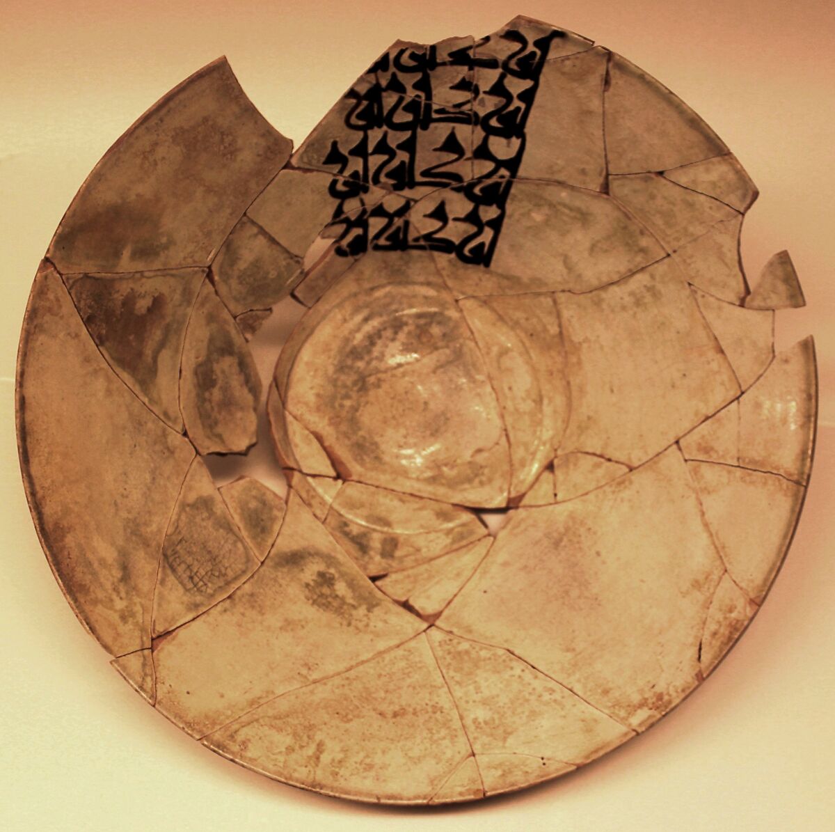 Bowl, Earthenware; white slip, brown-black slip decoration, greenish glaze