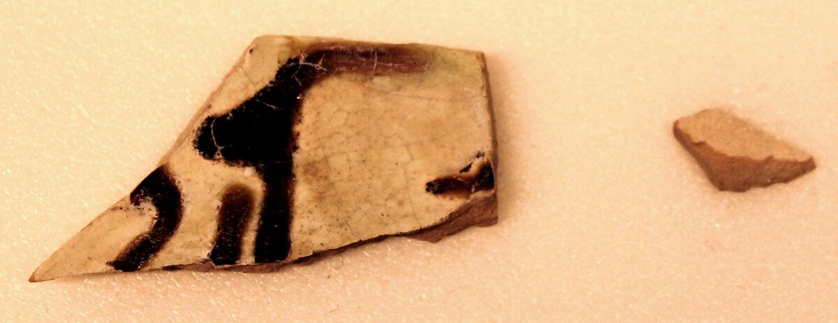 Bowl, Earthenware; white slip, brown-black slip decoration, greenish glaze