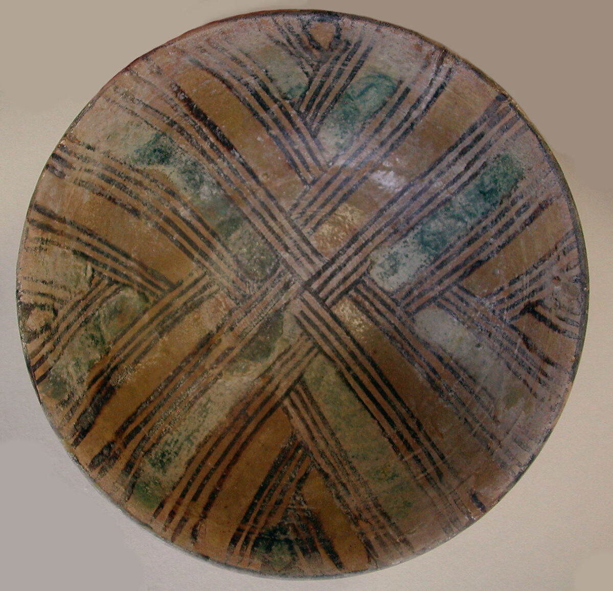 Bowl, Earthenware; buff slip, underglaze painted in polychrome pigments under transparent glaze 