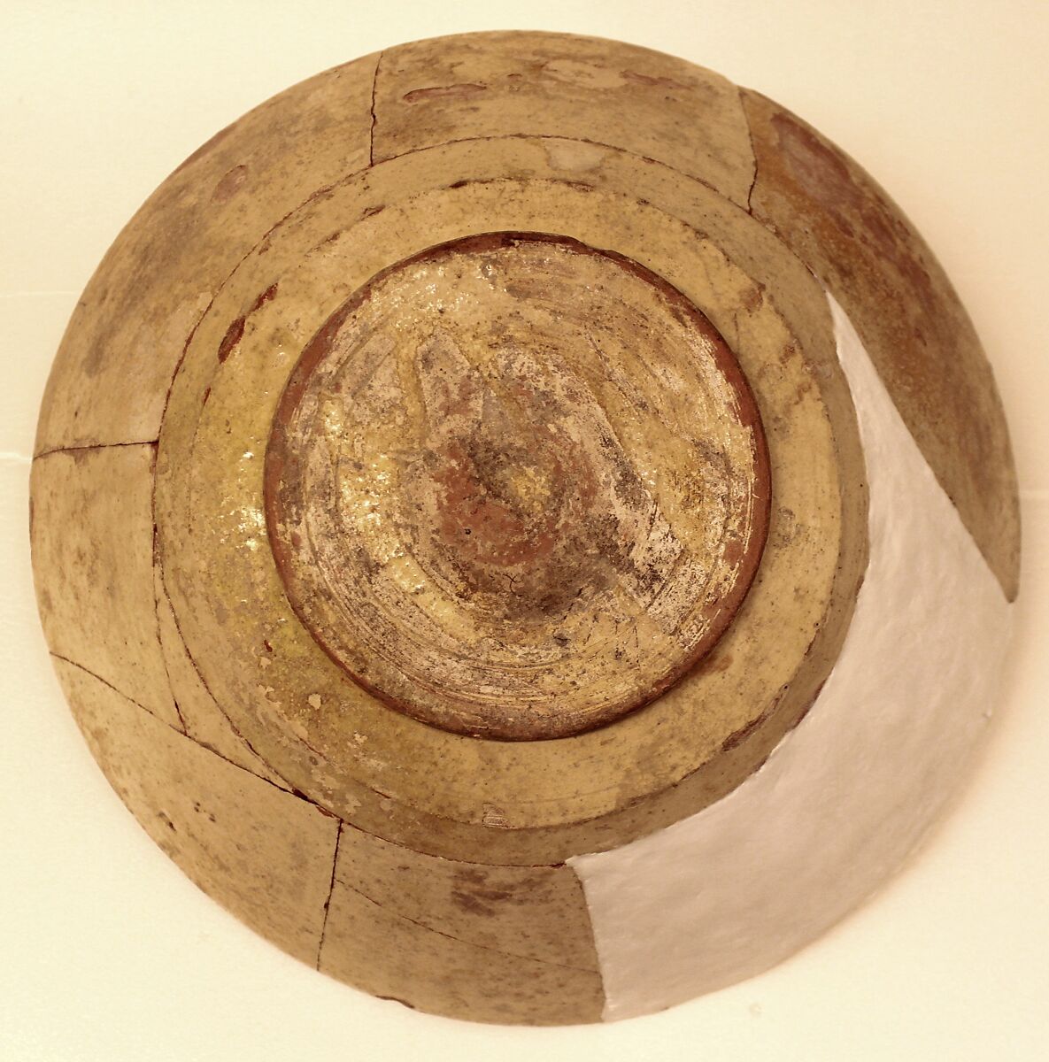 Bowl, Earthenware; white slip, decoration in purplish black, glazed