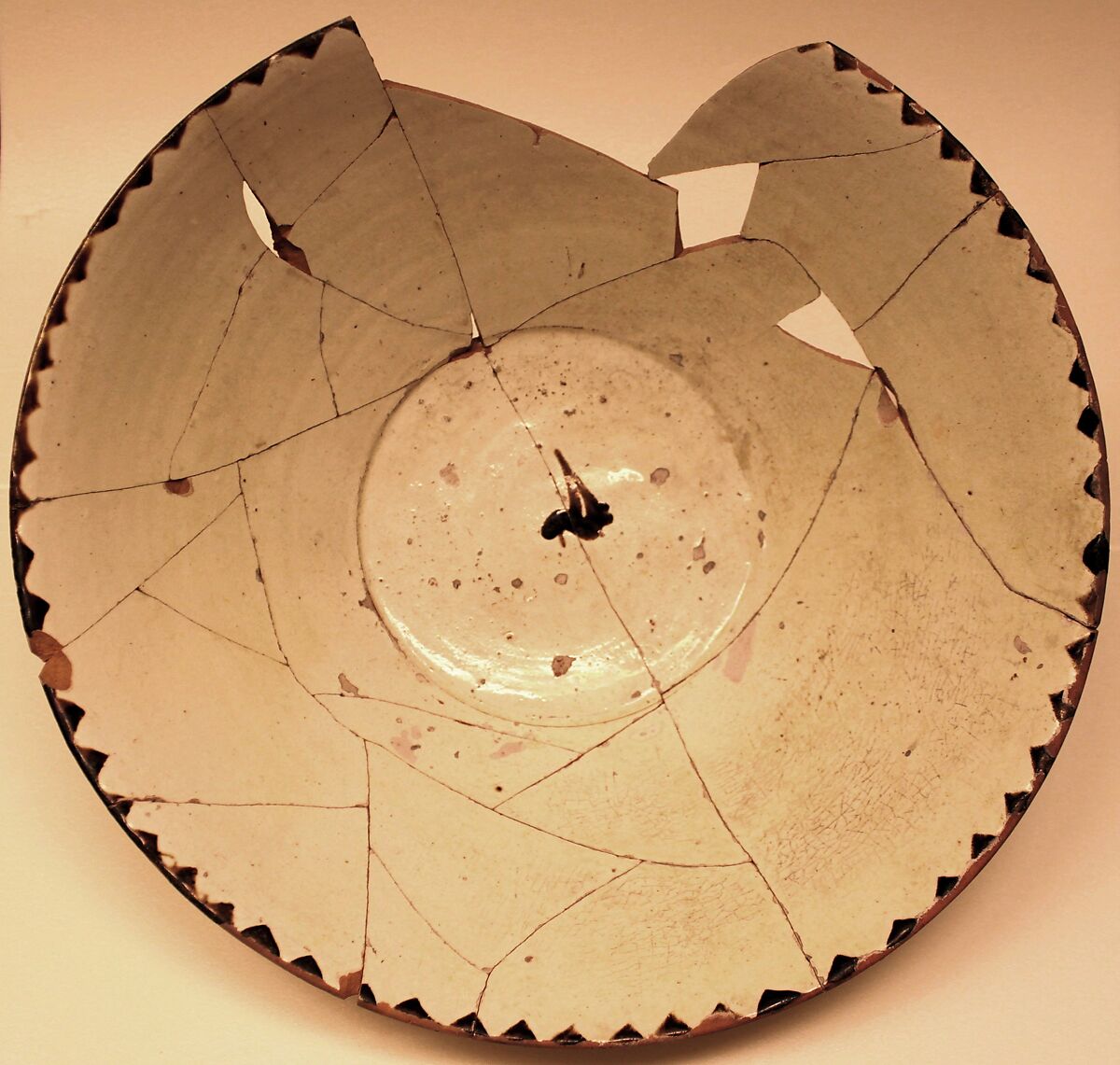 Bowl, Earthenware; white slip, brown-black slip decoration, glazed