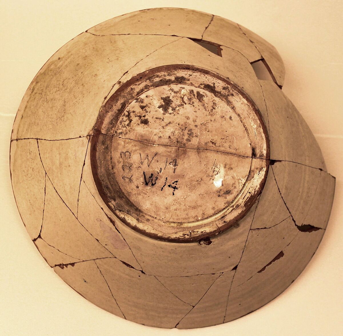 Bowl, Earthenware; white slip, brown-black slip decoration, glazed