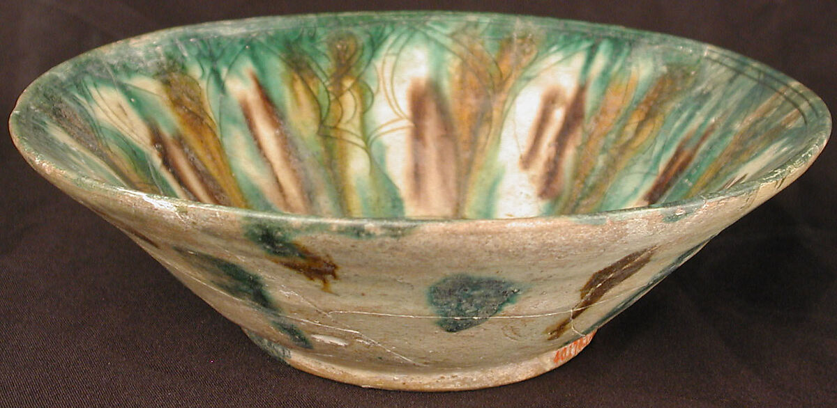 Bowl, Earthenware; white slip, incised and splashed with polychrome glazes under transparent glaze (sgraffito ware)