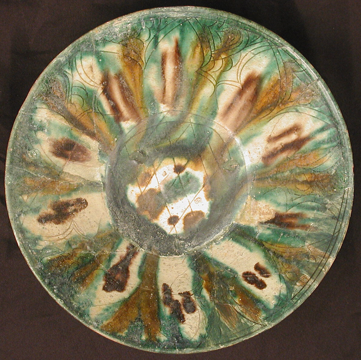 Bowl, Earthenware; white slip, incised and splashed with polychrome glazes under transparent glaze (sgraffito ware) 