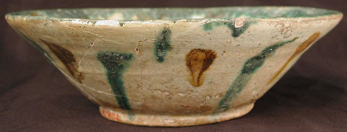 Bowl, Earthenware; white slip, incised and splashed with polychrome glazes under transparent glaze (sgraffito ware)