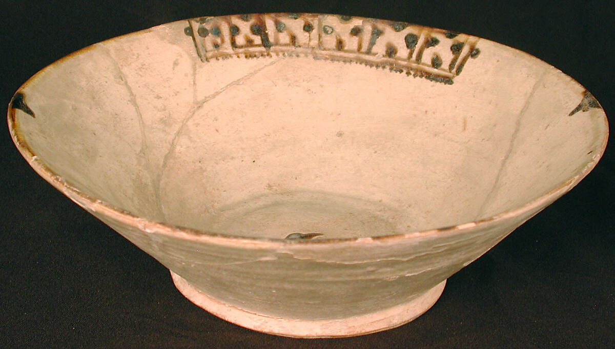 Bowl, Earthenware; white slip, brown-black decoration, glazed 