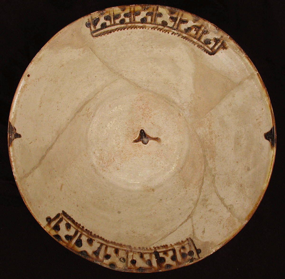 Bowl, Earthenware; white slip, brown-black decoration, glazed