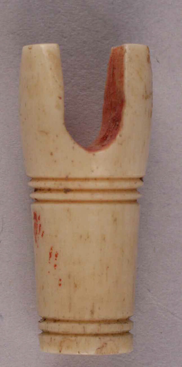 Nock, Bone; carved, incised 