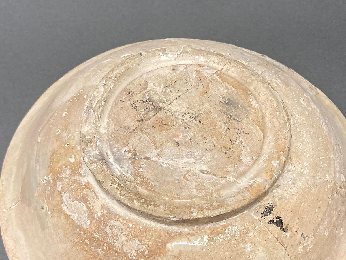 Bowl, Earthenware; buff slip, white glaze, brown-black decoration