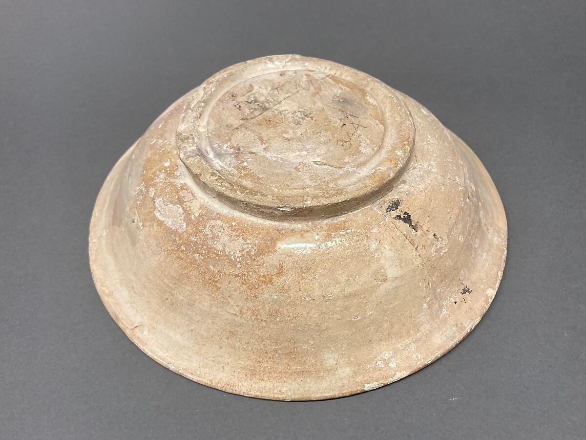 Bowl, Earthenware; buff slip, white glaze, brown-black decoration