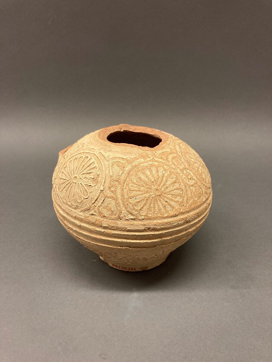 Fragment of an Ewer, Earthenware; molded decoration and unglazed