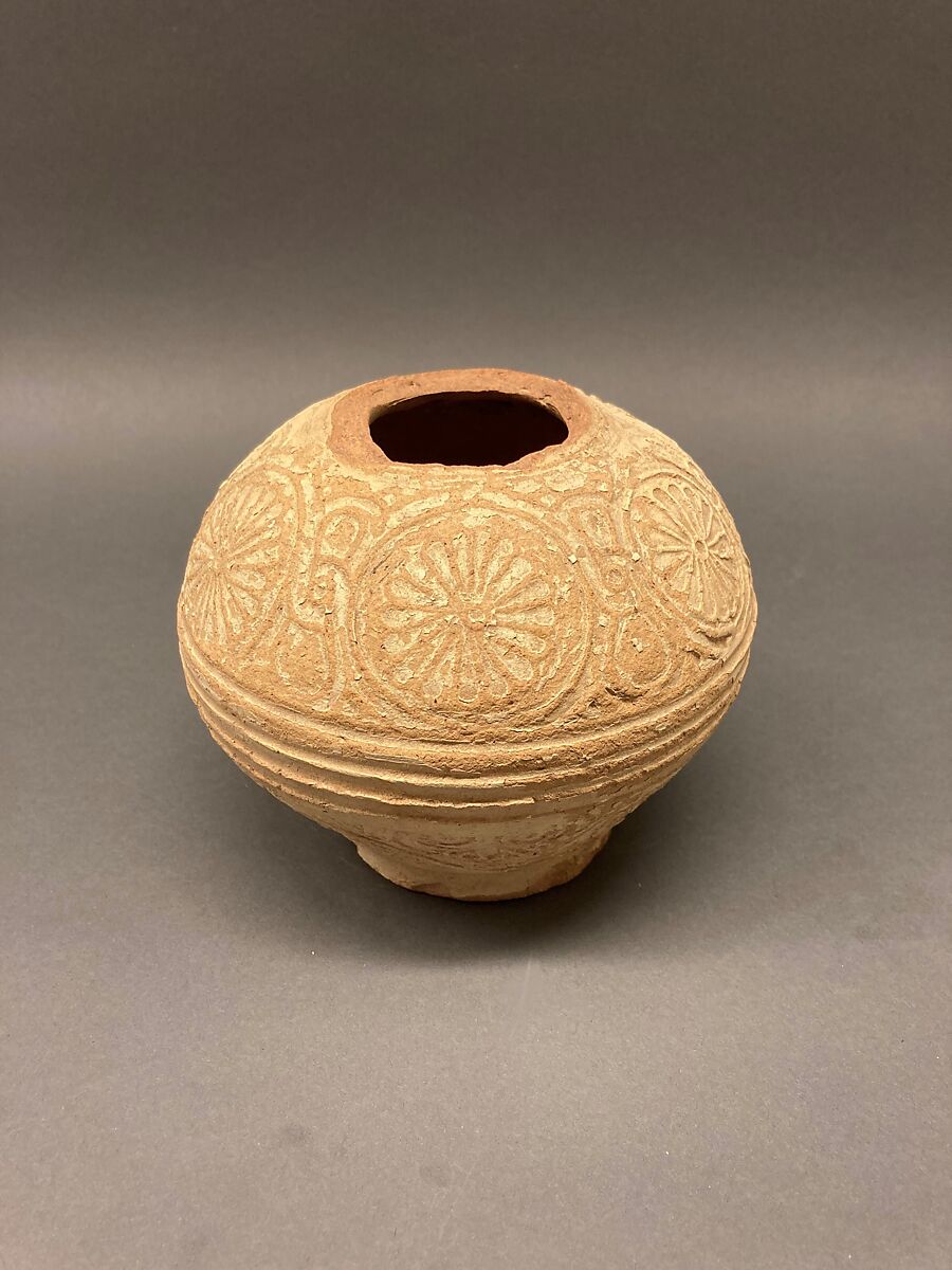 Fragment of an Ewer, Earthenware; molded decoration and unglazed