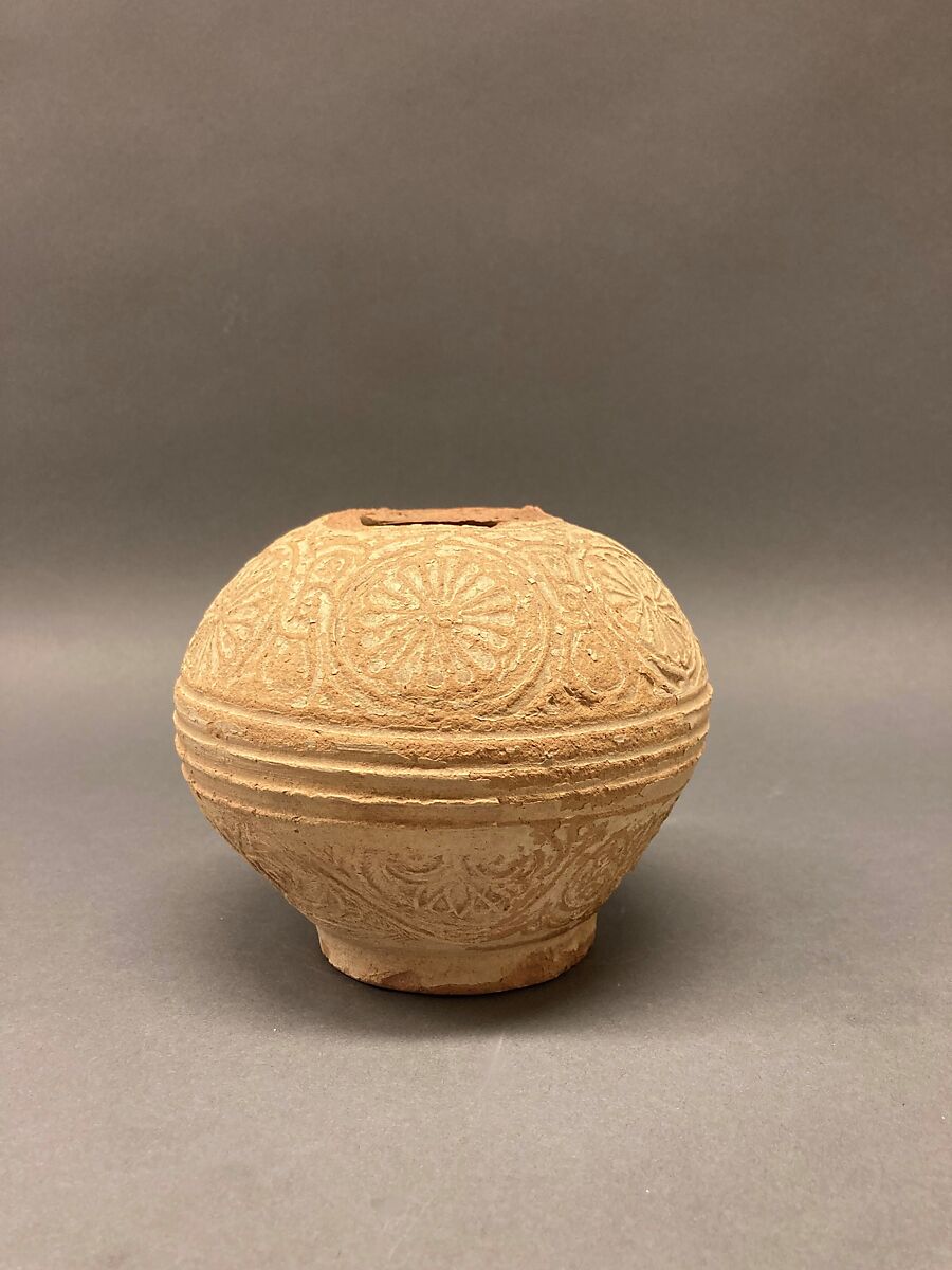 Fragment of an Ewer, Earthenware; molded decoration and unglazed