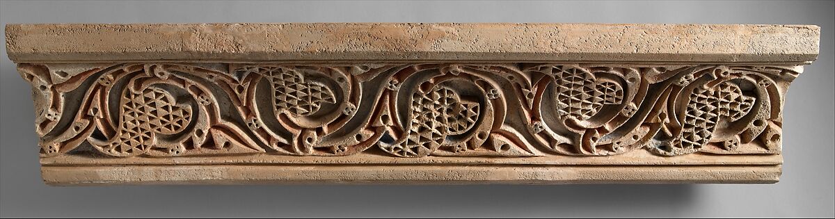 Fragment of a Painted Cornice Panel with Scrolling Vines, Stucco; carved and painted