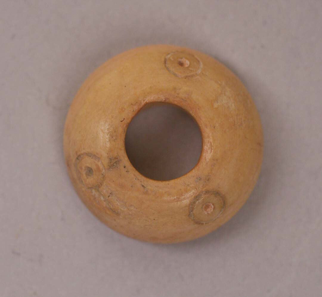Button or Bead, Bone; tinted, incised, and inlaid with paint 