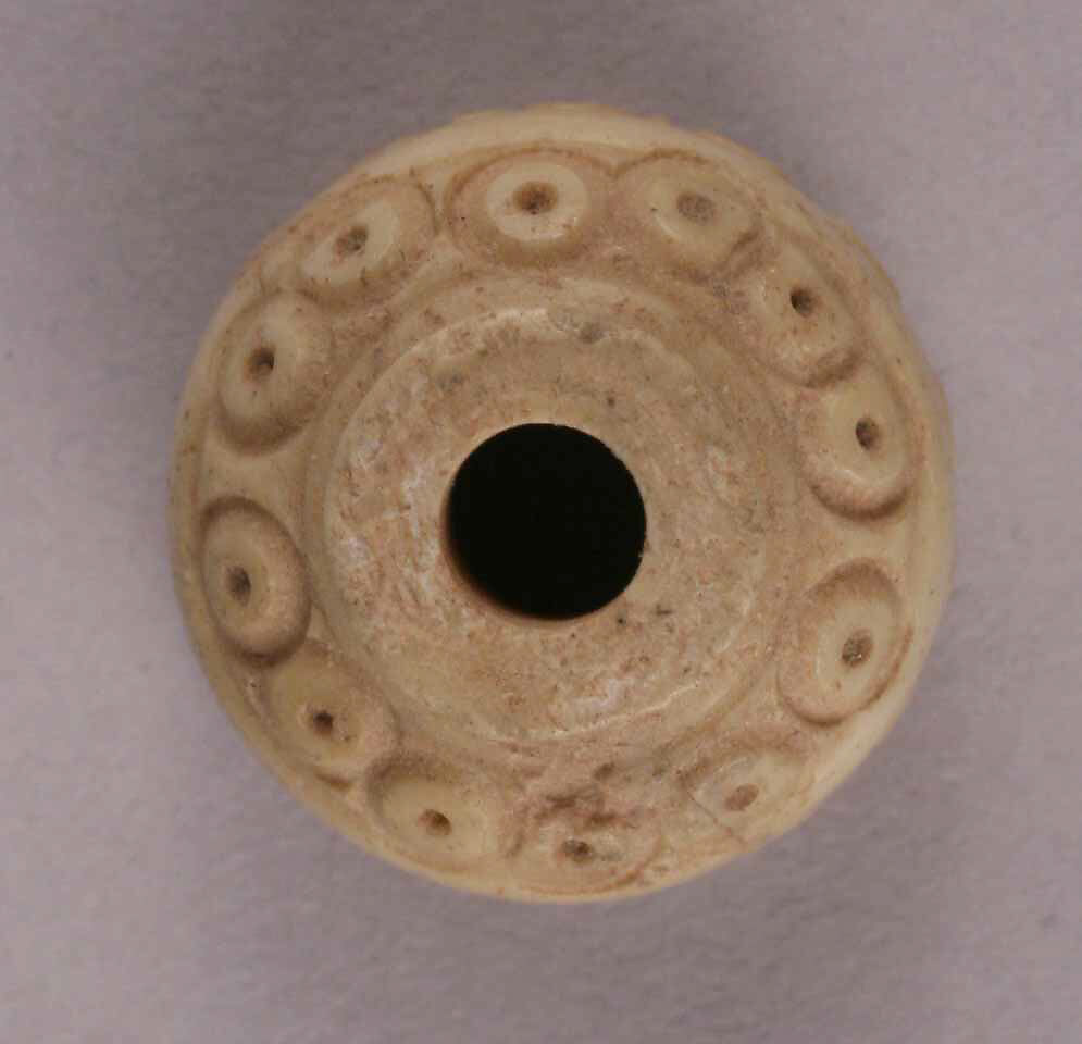 Spindle Whorl, Bone; incised and inlaid with paint 