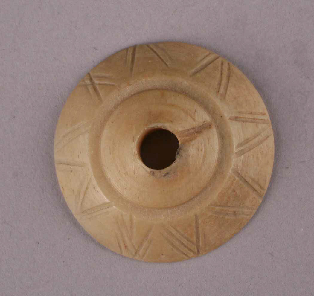 Spindle Whorl, Bone; incised 