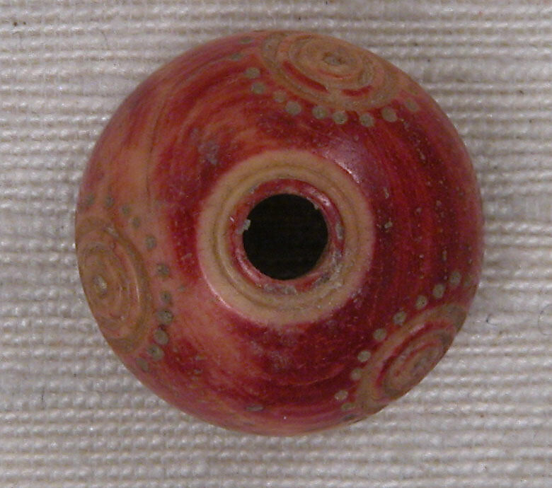 Button or Bead, Bone; tinted, incised, and inlaid with paint
