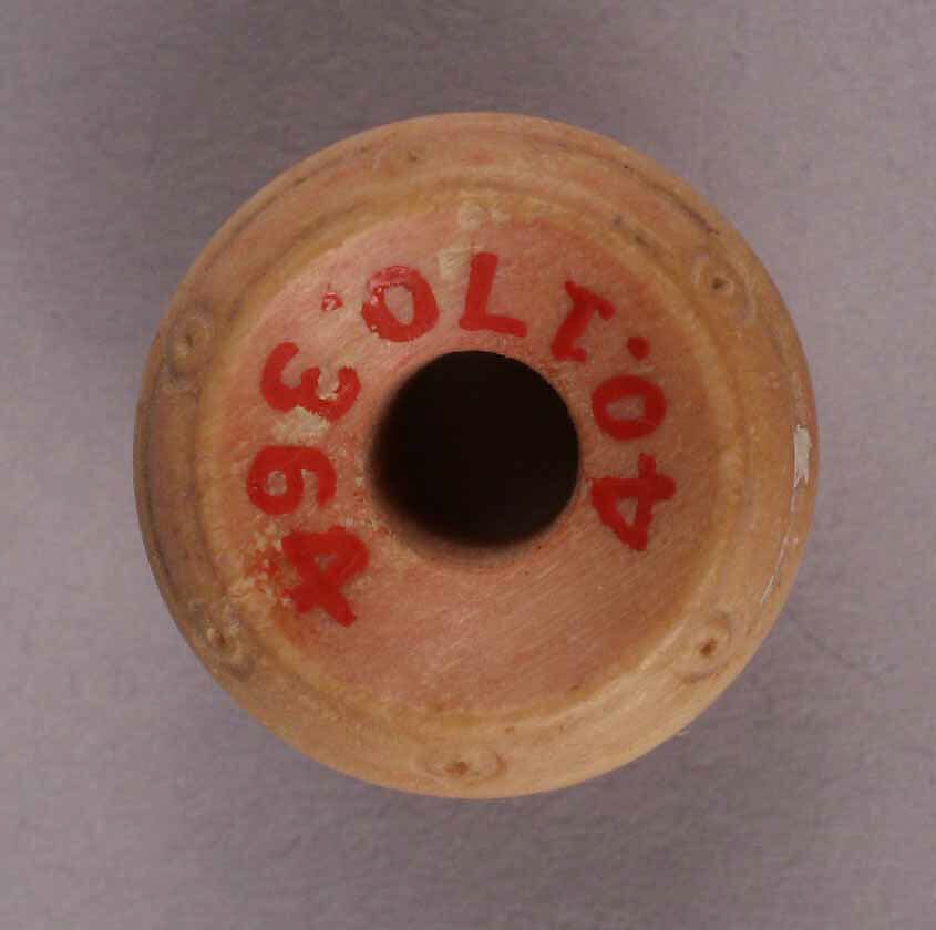 Spindle Whorl, Bone; tinted, incised, and inlaid with paint