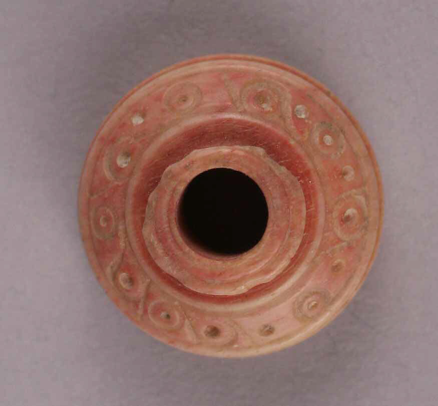 Spindle Whorl, Bone; tinted, incised, and inlaid with paint 