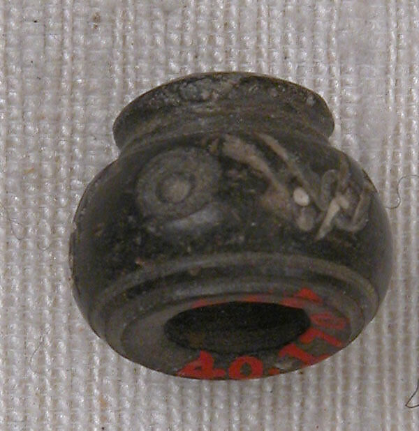 Button or Bead or Spindle Whorl, Stone; carved and incised