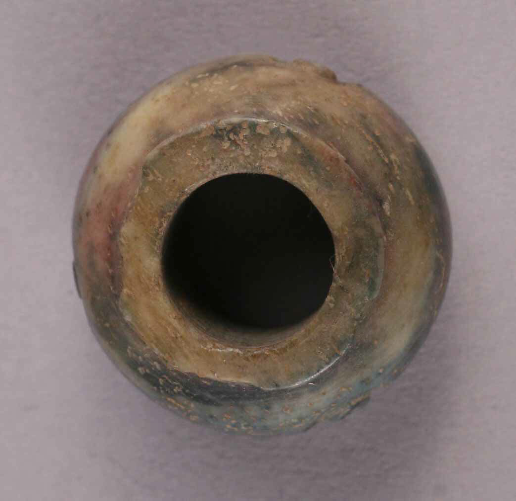 Button or Bead, Bone; tinted and incised