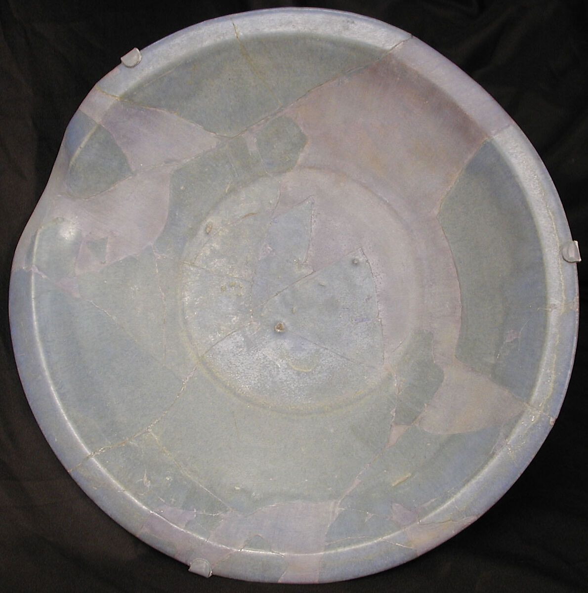 Plate, Earthenware; bluish glaze over grayish gritty body