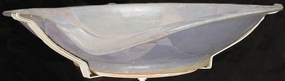 Plate, Earthenware; bluish glaze over grayish gritty body