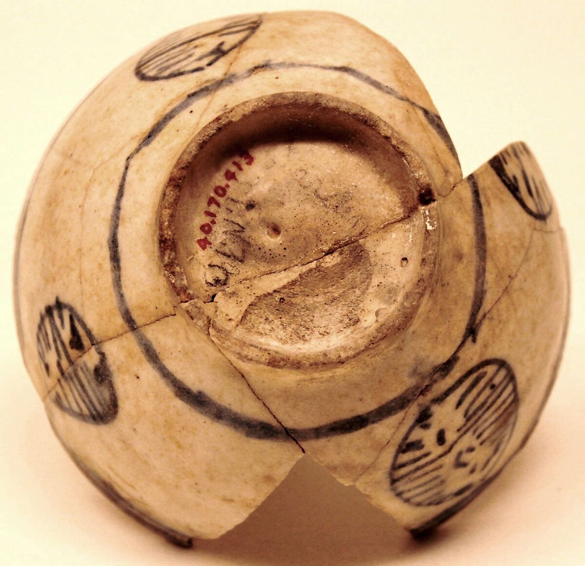 Bowl, Earthenware; gritty body, decoration in blue on white ground under glaze