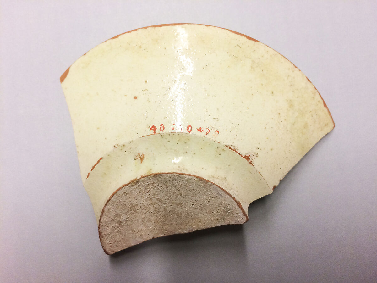 Ceramic Fragment, Earthenware; white slip, brown-black slip decoration, glazed
