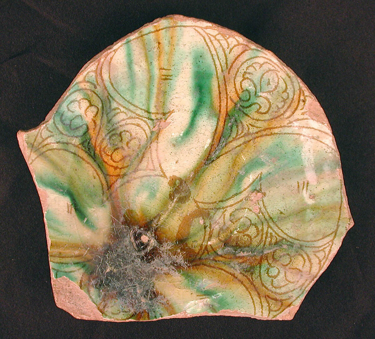 Fragment, Earthenware; white slip, incised and splashed with polychrome glazes under transparent glaze (sgraffito ware) 