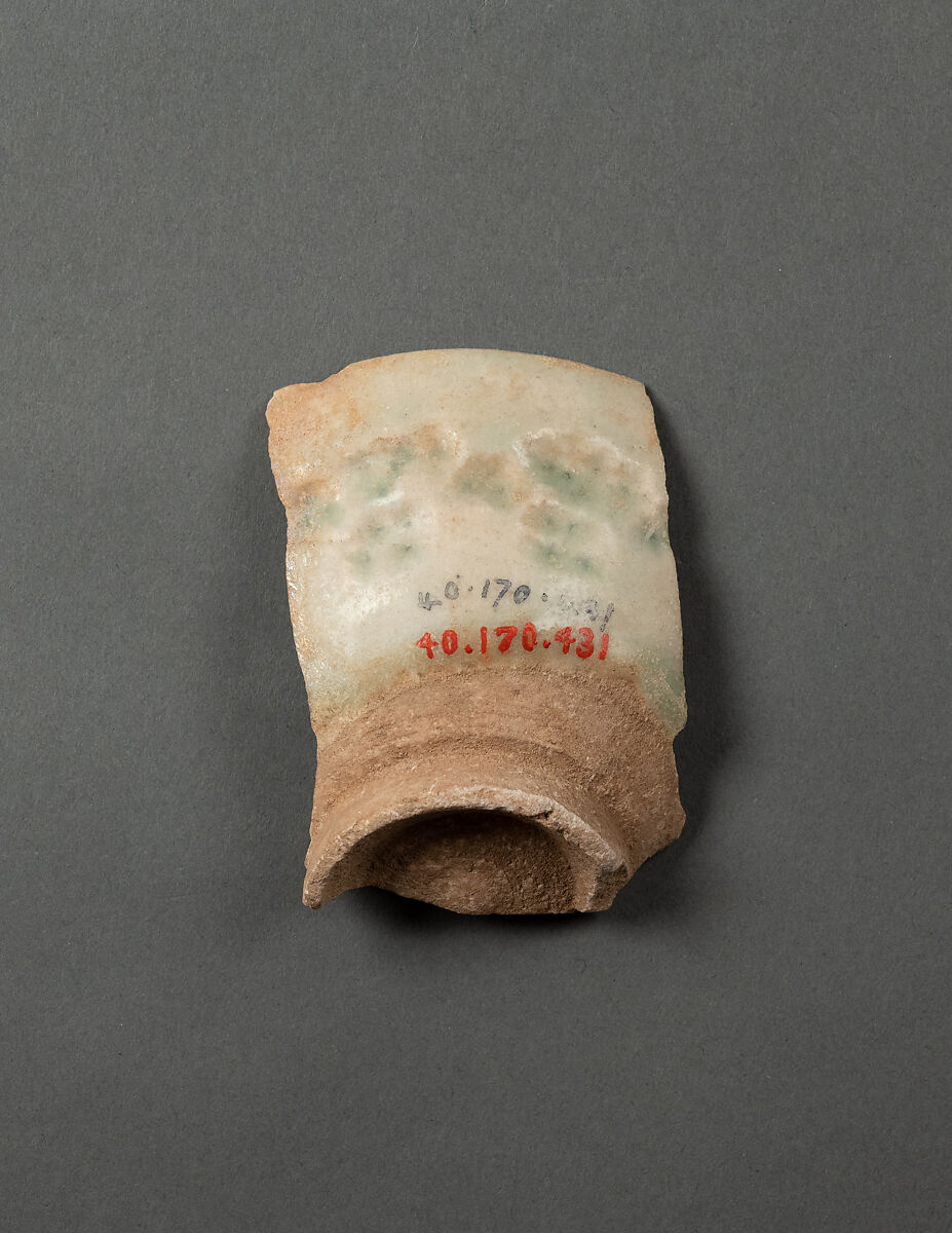 Ceramic Fragment, Earthenware; gritty gray body under blue streaked glaze 
