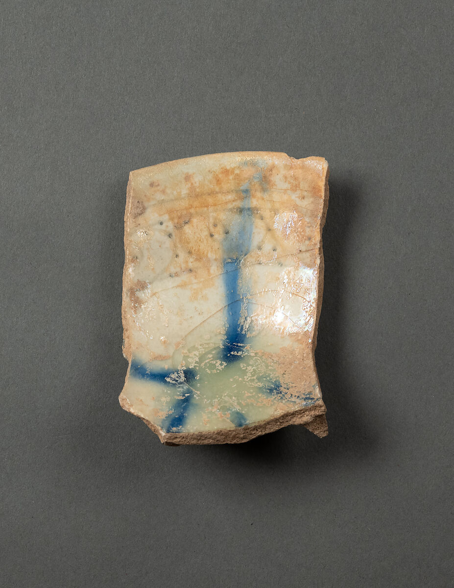 Ceramic Fragment, Earthenware; gritty gray body under blue streaked glaze 