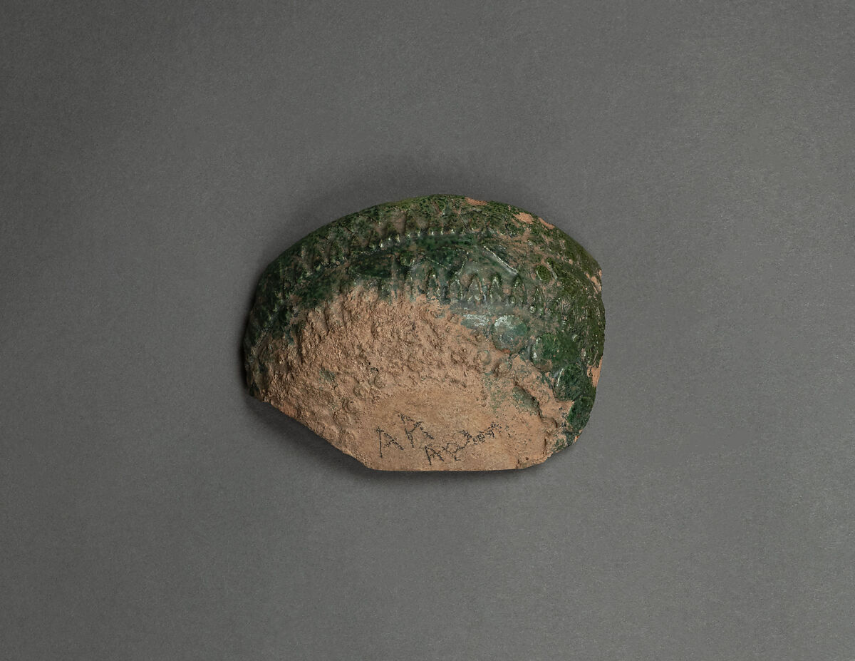 Fragment of a Bowl, Earthenware; molded decoration, green glazed 