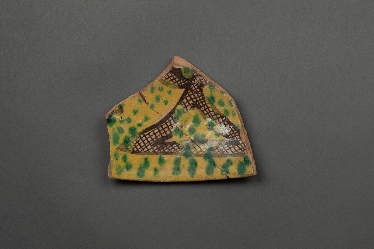 Fragment of a Bowl, Earthenware; white slip, incised and splashed with polychrome glazes under transparent glaze (sgraffito ware)