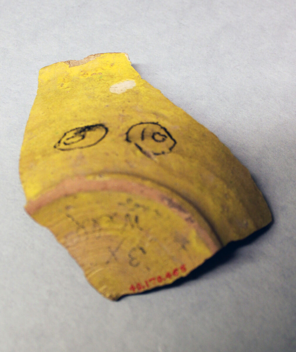 Fragment of a Bowl, Earthenware; buff slip, opaque yellow glaze, green decoration, glazed