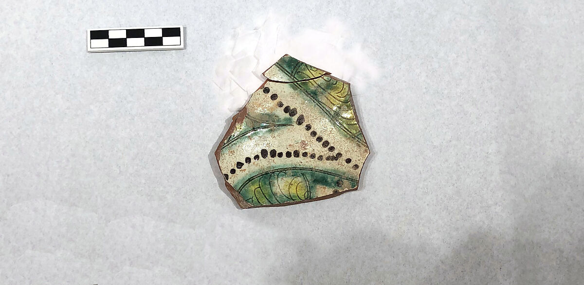 Fragment of a Bowl, Earthenware; white slip, incised and splashed with polychrome glazes under transparent glaze (sgraffito ware) 