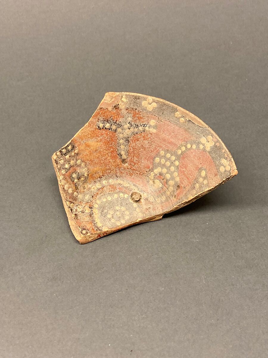 Fragment of a Dish, Earthenware; light red slip and black slip decoration under transparent glaze 