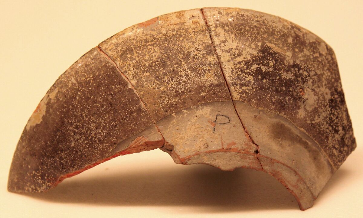 Ceramic Fragment, Earthenware; purplish slip, white decoration on black underglaze painting