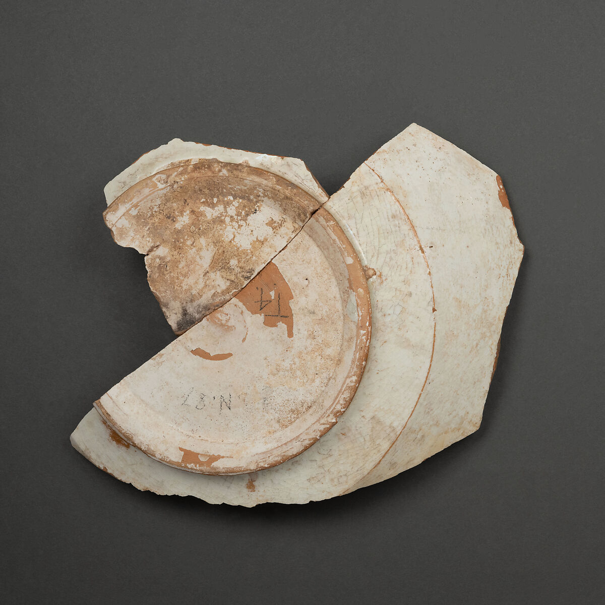 Fragment of a Bowl, Earthenware; white slip, black decoration