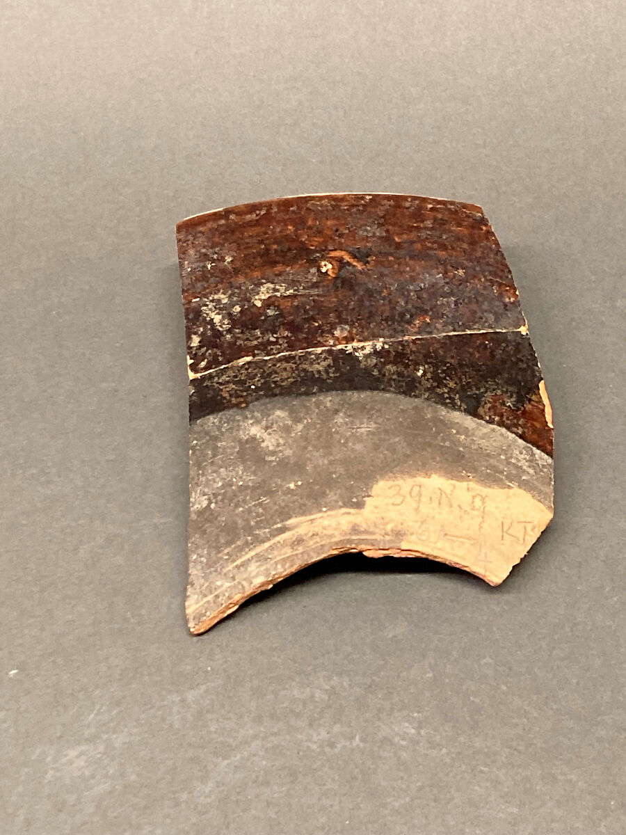 Fragment of a Bowl, Earthenware; reddish body, purplish black slip under brown glaze