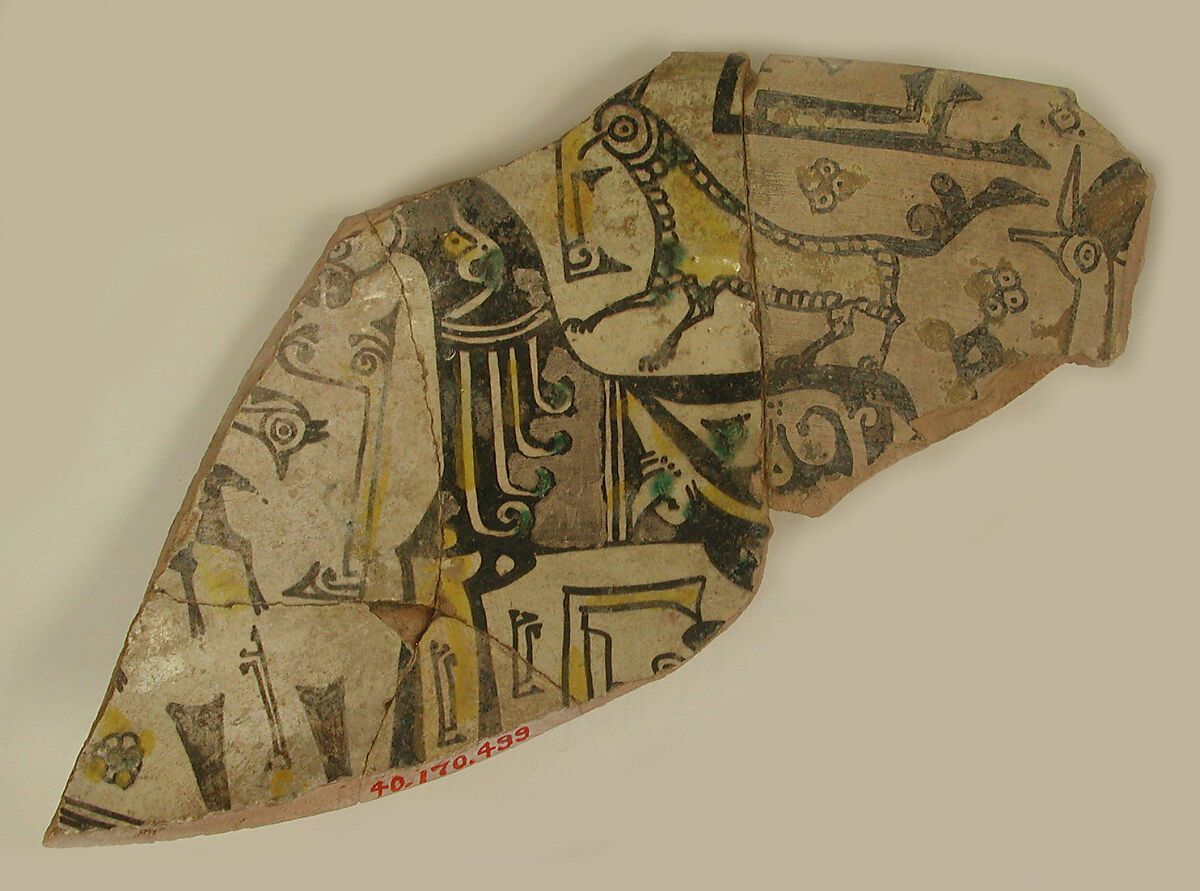 Fragment of a Bowl, Earthenware; painted in black slip and polychrome pigments under transparent colorless glaze (buff ware) 