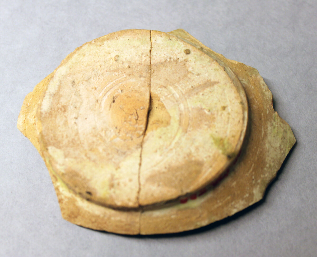 Fragment of a Bowl, Earthenware; white slip, yellowish-black and brown-black decoration under glaze