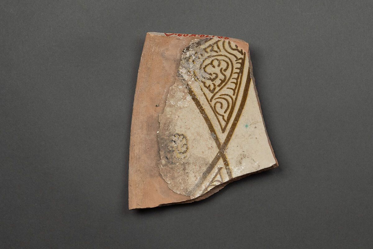 Fragments of a Bowl, Earthenware; reddish body, white slip and brownish decoration under glaze 