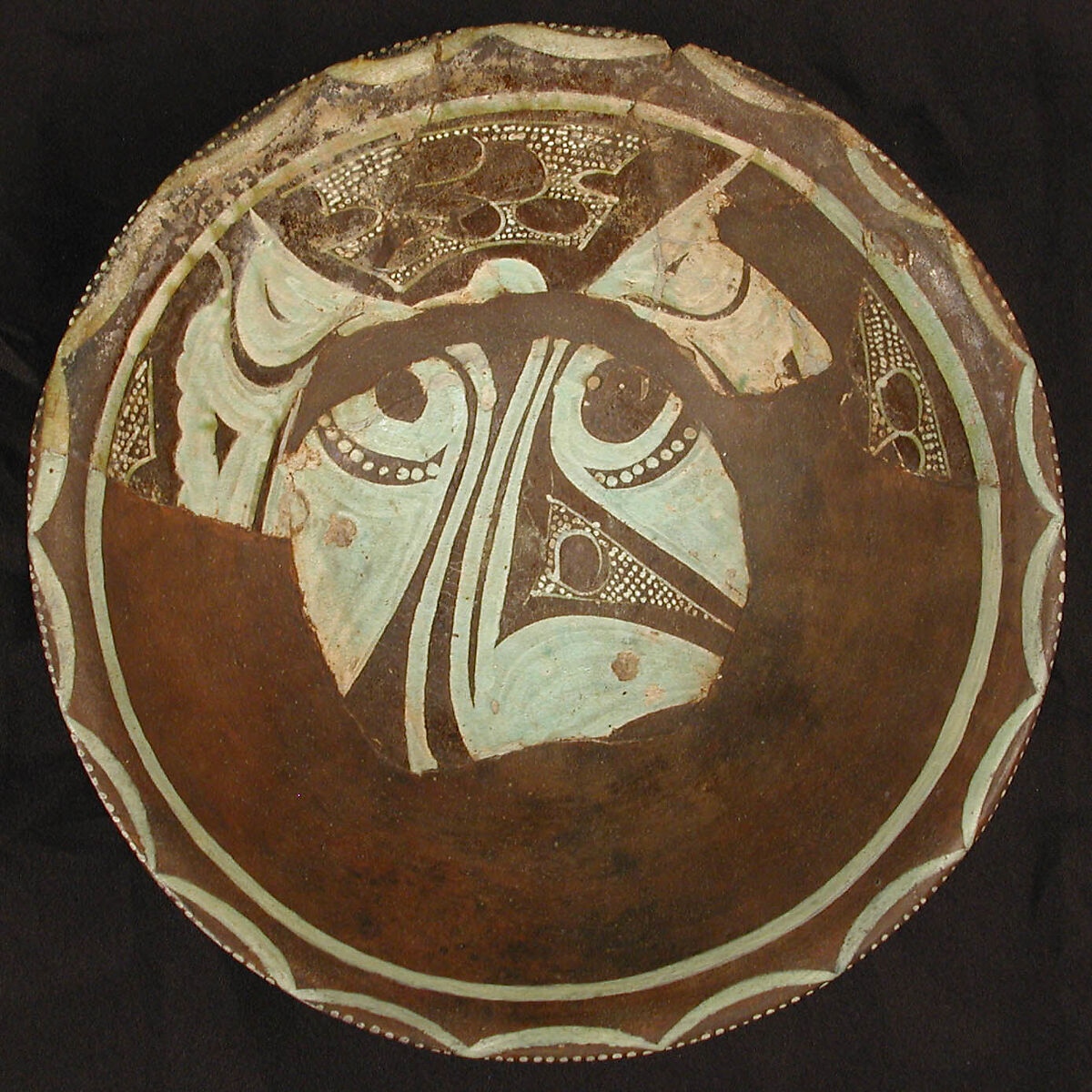 Bowl, Earthenware; purplish slip and white slip decoration under transparent glaze