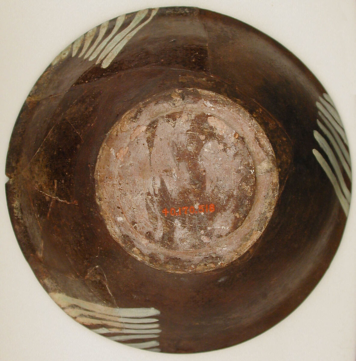 Bowl, Earthenware; purplish slip and white slip decoration under transparent glaze