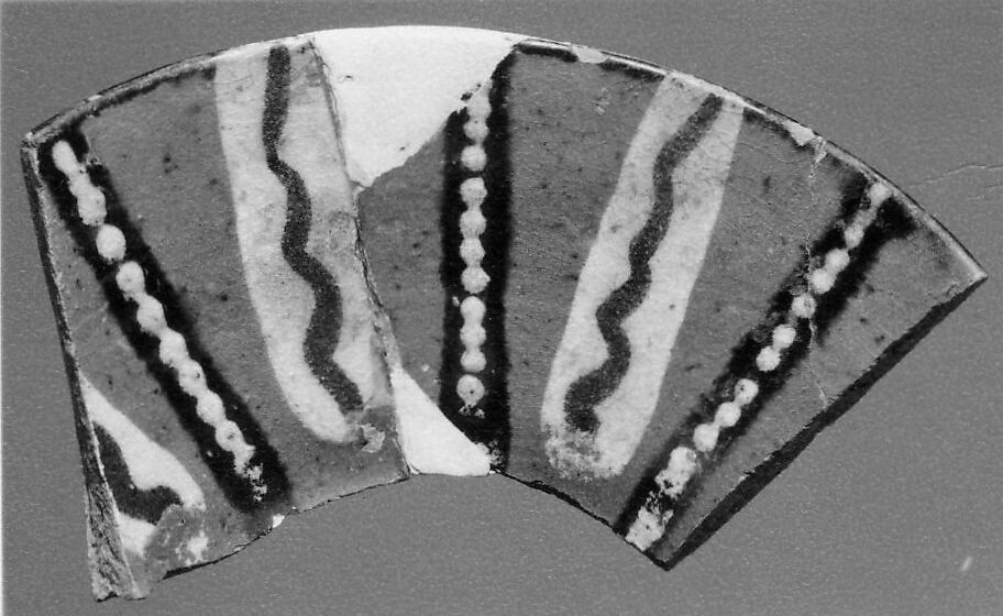 Fragment of a Bowl, Earthenware; reddish body, red slip, polychrome slip decoration under glaze