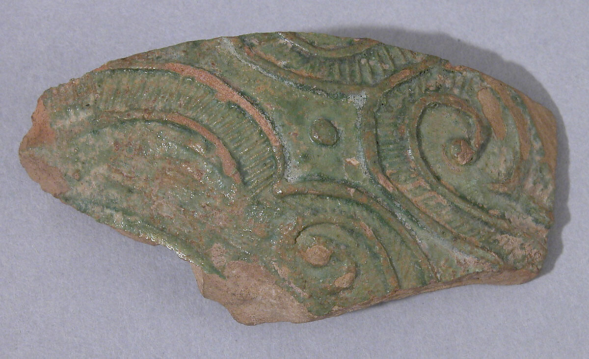Fragment, Earthenware; molded decoration of spirals and dots, green glaze 